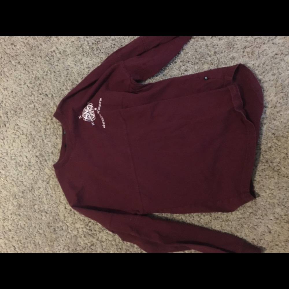 A maroon camp shirt